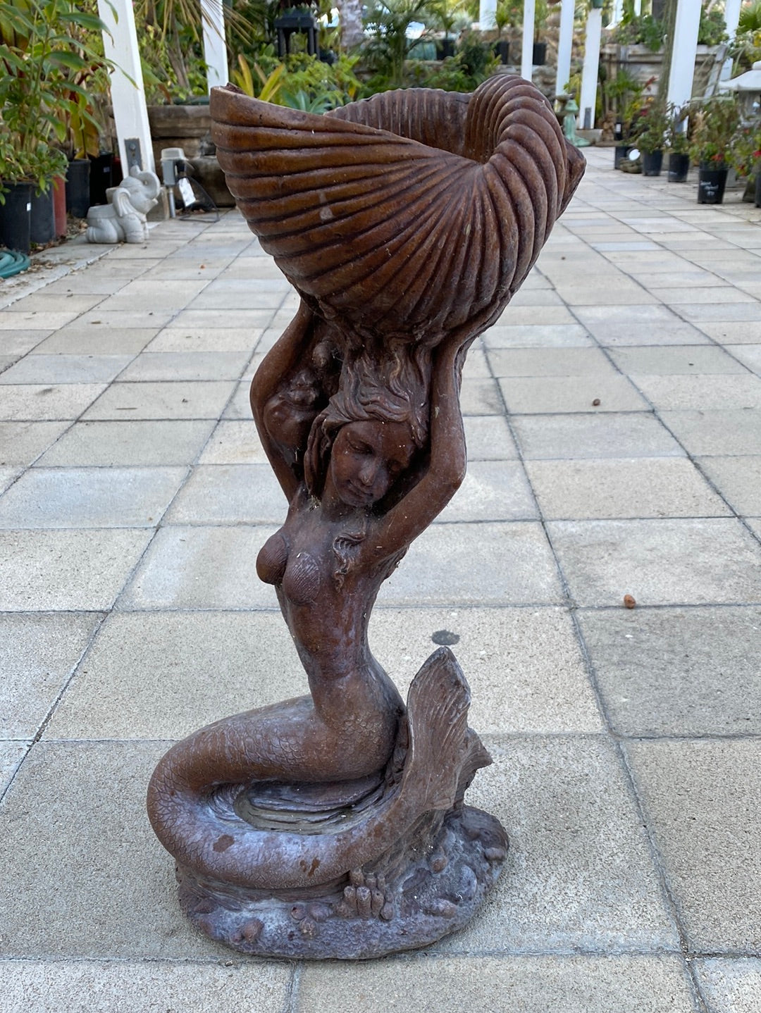 Lifting Mermaid Statue